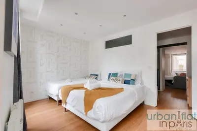 Un ou plusieurs lits dans un hébergement de l'établissement 04 Best Flat Montorgeuil 3