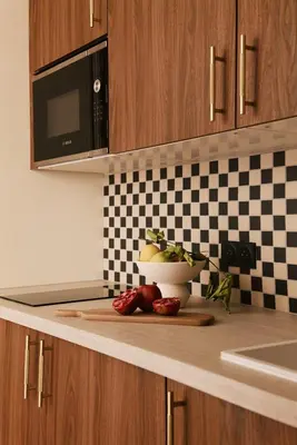 Cuisine ou kitchenette dans l'établissement Résidence Louvre