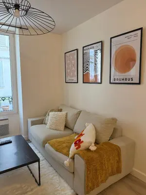 Coin salon dans l'établissement Appartement T2 cooconing, Paris 11ème