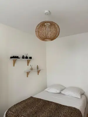 Un ou plusieurs lits dans un hébergement de l'établissement Appartement T2 cooconing, Paris 11ème