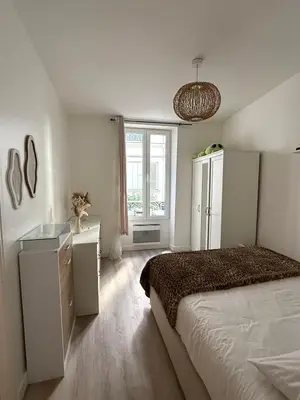 Un ou plusieurs lits dans un hébergement de l'établissement Appartement T2 cooconing, Paris 11ème
