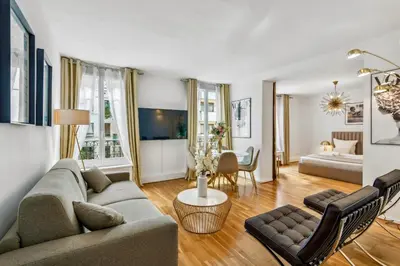 Coin salon dans l'établissement Amazing Apt 3BDR near The Eiffel Tower