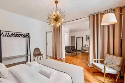 Un ou plusieurs lits dans un hébergement de l'établissement Amazing Apt 3BDR near The Eiffel Tower