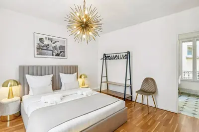 Un ou plusieurs lits dans un hébergement de l'établissement Amazing Apt 3BDR near The Eiffel Tower