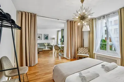 Un ou plusieurs lits dans un hébergement de l'établissement Amazing Apt 3BDR near The Eiffel Tower