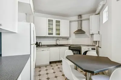 Cuisine ou kitchenette dans l'établissement Amazing Apt 3BDR near The Eiffel Tower