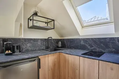 Cuisine ou kitchenette dans l'établissement Charming Studio Center of Paris-Montorgueil