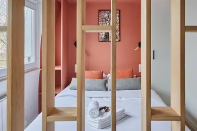 Un ou plusieurs lits dans un hébergement de l'établissement Charming Studio Center of Paris-Montorgueil