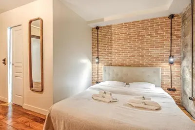 Un ou plusieurs lits dans un hébergement de l'établissement Industrial loft - Le Marais - Bastille