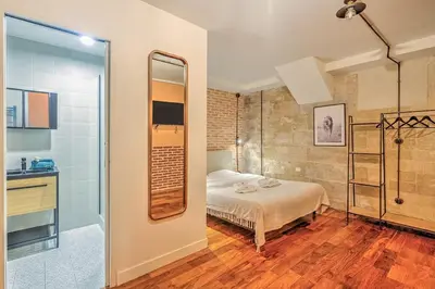 Un ou plusieurs lits dans un hébergement de l'établissement Industrial loft - Le Marais - Bastille
