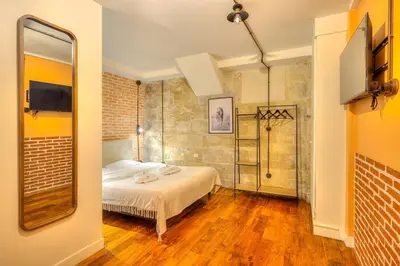 Un ou plusieurs lits dans un hébergement de l'établissement Industrial loft - Le Marais - Bastille