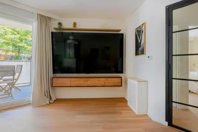 Télévision ou salle de divertissement dans l'établissement Paris West Elegant residence