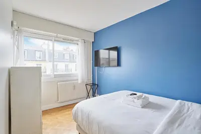 Un ou plusieurs lits dans un hébergement de l'établissement 2 bedroom flat Centre de Paris - Eiffel Tower view