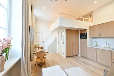 Cuisine ou kitchenette dans l'établissement Superb Apartment Center of Paris Le Marais