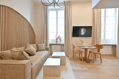 Coin salon dans l'établissement Superb Apartment Center of Paris Le Marais
