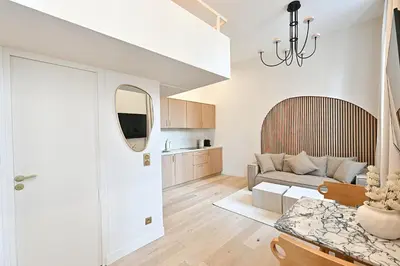 Cuisine ou kitchenette dans l'établissement Superb Apartment Center of Paris Le Marais