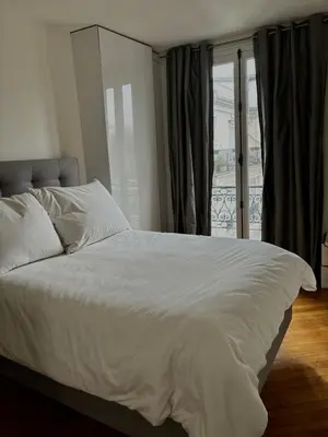 Un ou plusieurs lits dans un hébergement de l'établissement Golden Triangle Champs-Élysées
