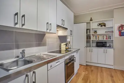 Cuisine ou kitchenette dans l'établissement Apartment 2 bedrooms Center of Paris