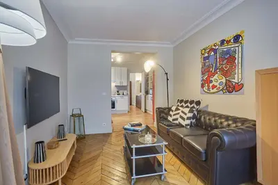 Télévision ou salle de divertissement dans l'établissement Apartment 2 bedrooms Center of Paris