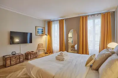 Un ou plusieurs lits dans un hébergement de l'établissement Apartment 2 bedrooms Center of Paris