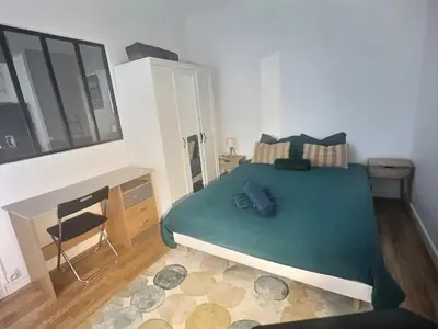 Un ou plusieurs lits dans un hébergement de l'établissement Appartement lumineux aux portes de Paris Séjour longue durée idéal Pour Couple & Professionnels