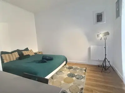 Un ou plusieurs lits dans un hébergement de l'établissement Appartement lumineux aux portes de Paris Séjour longue durée idéal Pour Couple & Professionnels