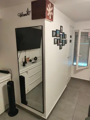 Télévision ou salle de divertissement dans l'établissement Urban Nest Paris 10