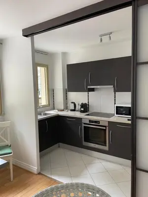 Cuisine ou kitchenette dans l'établissement French Welcome