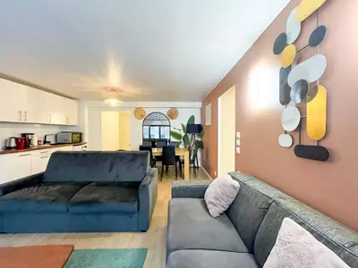 Coin salon dans l'établissement Urban Flat 194 - Cosy 3 Bedroom Opera Grands Boulevards