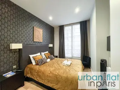 Un ou plusieurs lits dans un hébergement de l'établissement Urban Flat 62 - Beautiful Apartment Mermoz Champs-Elysees