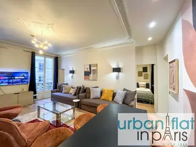 Coin salon dans l'établissement Urban Flat 63 - 3 Bedrooms Flat Champs-Elysees Mermoz
