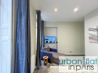 Coin salon dans l'établissement Urban Flat 63 - 3 Bedrooms Flat Champs-Elysees Mermoz