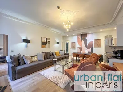 Coin salon dans l'établissement Urban Flat 63 - 3 Bedrooms Flat Champs-Elysees Mermoz