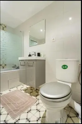 Salle de bains dans l'établissement 3 pièces Arc de Triomphe RDC