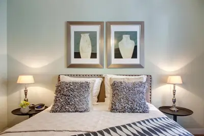 Un ou plusieurs lits dans un hébergement de l'établissement Paris Sevigne Elegant residence