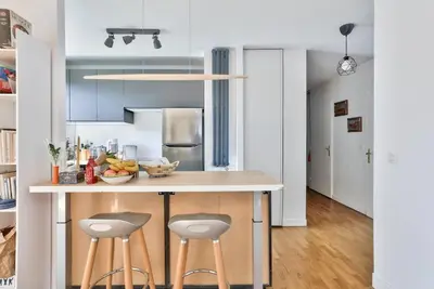 Cuisine ou kitchenette dans l'établissement Bel appart lumineux et cosy