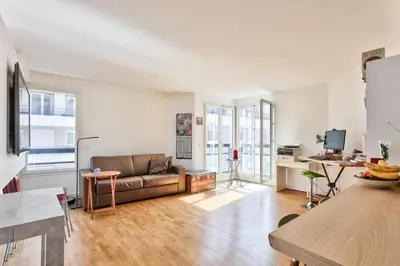 Coin salon dans l'établissement Bel appart lumineux et cosy