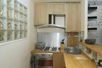 Cuisine ou kitchenette dans l'établissement Le Reflet du Temps