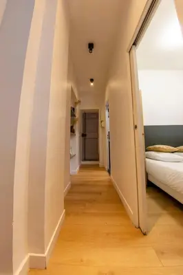 Un ou plusieurs lits dans un hébergement de l'établissement Agréable appartement dans le 13ème arrondissement