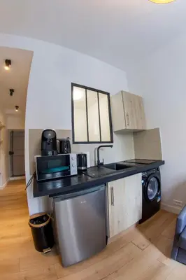 Cuisine ou kitchenette dans l'établissement Agréable appartement dans le 13ème arrondissement