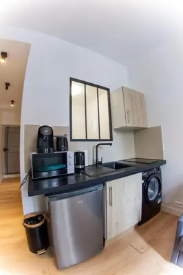 Cuisine ou kitchenette dans l'établissement Agréable appartement dans le 13ème arrondissement
