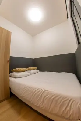 Un ou plusieurs lits dans un hébergement de l'établissement Agréable appartement dans le 13ème arrondissement