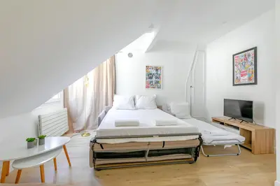 Un ou plusieurs lits dans un hébergement de l'établissement Appartement Gare de Lyon - Bastille lumineux