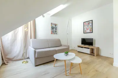Télévision ou salle de divertissement dans l'établissement Appartement Gare de Lyon - Bastille lumineux