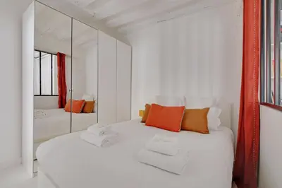 Un ou plusieurs lits dans un hébergement de l'établissement Pick A Flat's Apartment in Saint-Germain des Prés - Rue Princesse