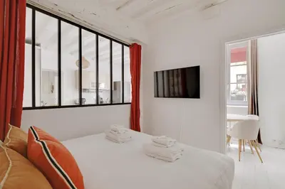 Un ou plusieurs lits dans un hébergement de l'établissement Pick A Flat's Apartment in Saint-Germain des Prés - Rue Princesse