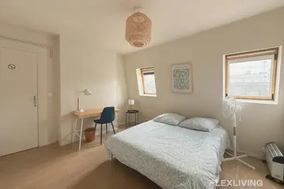 Un ou plusieurs lits dans un hébergement de l'établissement Flexliving - whole flat - Turbigo 6