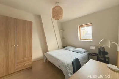 Un ou plusieurs lits dans un hébergement de l'établissement Flexliving - whole flat - Turbigo 6