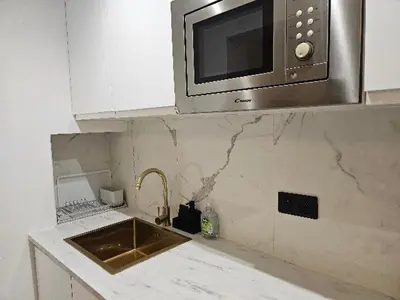Cuisine ou kitchenette dans l'établissement Appartement entier, 2 chambres