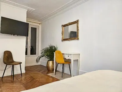 Un ou plusieurs lits dans un hébergement de l'établissement Appartement entier, 2 chambres